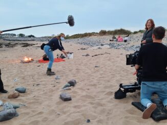 Arwen with clapper board